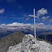 Auf dem Gipfel mit Rothorn dahinter und Berner Oberland im Hintergrund.