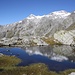 La <b>Cima di Camadra (3172 m)</b> e il <b>Piz Medel (3211 m)</b> si rispecchiano nello splendido laghetto a quota 2496 m.
