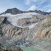 Tiefengletscher vom Chräijennest 2594m aus mit Toteis am Gletschersee. Der Gletscher hat sich über eine Steilstufe zurückgezogen 