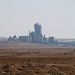 Tag 3 (22.10.):<br /><br />Zementfabrik in wüstenähnlicher Umgebung bei القطرانة (Al Qaţrānah). Zuvor ist ein Gleis der nicht mehr in Betrieb stehenden Hedschasbahn.