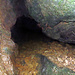 Bei der Quelle der Areuse. Am Usrprung findet man eine Höhle welche mit fliessendem Wasser gefüllt ist.