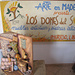 Ingresso all'esposizione dei lavori in legno e pietra dell'Artesanos Don Bosco a Jangas