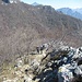 Risalita la ripida abetaia del Sasso Malascarpa, si segue la rocciosa cresta che porta verso il Monte Prasanto.