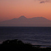Tag 2 (28.4.):<br /><br />Die Umrisse der Ilha do Fogo mit dem majestätischen Landeshöhepunkzt Kap Verdes und immer wieder aktiven Vulkan Poco do Fogo (2829m).