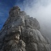 Aufstieg – letzte schwierigere Kletterstelle durch einen kurzen Kamin und ausgesetzte Bandquerung nach rechts<br />