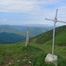La croce ed il panorama da Cima Legnà.