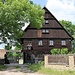Kravaře, Umgebindehaus, einstiges Gemeindehaus des eingemeindeten Ortes Víska (Dörfel), größtes Holzwohnhaus Böhmens