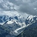 Berninagruppe von Las Sours mit sehr stark zurück gegangenen Moerteratschgletscher
