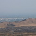 Tag 8 (27.7.):<br /><br />Blick auf Iğdır (861m), das unterhalb von alten ausgedehnten Lavafeldern in einer fruchtbaren Ebene an der Grenze zu Armenien liegt. Die Lavströme stammen vom Ararat und wurden von der kleinen, bis 1077m hohen Hügeln zurück gehalten.