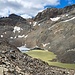 Die Reste des Gelttalferners mit Gletschersee.<br />Oberhalb des Sees kann man im Hang den Weg von der Rieserfernerhütte zum Mühlbacher Jöchl erahnen.