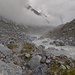 Regen und imposant angeschwollener Gletscherabfluss am vierten Tag beim Abstieg nach Maloja