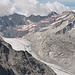 Vom Gipfel des Monte del Forno hat man Einblick in fast die gesamte Abstiegsroute. Rot eingezeichnet der sichtbare Teil, im oberen Bereich violett der verdeckte Abschnitt rund um die Abseilstelle