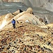 La bella cresta, Matteo con alle spalle il laghetto glaciale del ghiacciaio piz d'Agnel