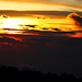 Tag 6 (2.11.):<br /><br />Die einzigartige Szene am Abend vor Sonnenuntergang am Biwakplatz auf dem Karthala Kraterrand.