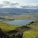 Blick gen Hekla, in den Wolken.Der See unterhalb, rechts davon etwas weiter liegt der Campingplatz.