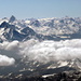 Aostatal im Nebel. Darüber der Monte Emilius und La Grivola. Am Horizont einiges unterwegs...uiuiuih!<br />Barre des Ecrins und Grande Casse.  