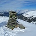 Der Steinmann am Gipfel.  Im Norden drückt's schon Wolken in die Kelchsau.