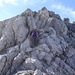 Trainman beim Abstieg vom Hauptgipfel der Steinkarspitze