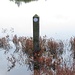 erinnert an einen versunkenen Turm im Stausee (Alt-Graun / Reschensee)