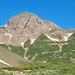 <b>Là in alto svettano le imponenti cime che coronano la valle: questa è la [https://www.hikr.org/tour/post181205.html  Punta di Valrossa (2968 m)].</b>