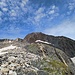 Il Monte del Forno, dopo aver aggirato la sua cresta E. Sull'estrema sinistra, la sella vicino a q. 2942mt