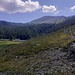 Punta Chaligne in vista e il Rifugio Chaligne riparato dalla magnifico bosco di conifere. 