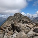 Auf dem Gipfel des Äußeren Grieskogel mit dem Ministeinmann