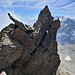 Wie ein Dreizack. der kecke Gipfel des Chli Dirruhorns, dahinter von rechts u.a. Brunegghorn, Bis- und Weisshorn, Obergabelhorn, Dent d'Hérens und Matterhorn