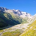 Beim Aufstieg mit Blick ins Val Frisal und Aron ist noch knapp auf dem Foto zu sehen