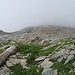 sguardo indietro alla sella e alla cima ancora avvolta nelle nuvole