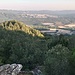 Salendo di quota il panorama comincia ad allargarsi; qui si vede Tempio Pausania e, oltre, Aggius con la Valle della Luna.