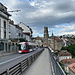 Unterwegs in Freiburg (Fribourg) - Wagen 6602 befährt die Rte des Alpes. Immer wieder wecheln sich Sonne und Wolken ab.