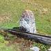 Brunnen auf Matan. Bei Föhn landet das Wasser neben dem Trog.