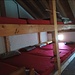 il dormitorio è ben attrezzato con 10 posti letto per piano, materassi, cuscini e coperte...oltre all'aria condizionata che entra dalla finestrella