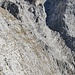 Der Steinmann in Bildmitte auf der Begrenzungsrippe der mächtigen Südrinne wird angepeilt. 