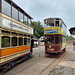 Unterwegs im Crich Tramway Village - Leeds City Transport No. 399 und Glasgow Corporation Transport No. 22 kreuzen an der Station Wakebridge. Gut ist zu erkennen, wie der Token an No. 399 übergeben wird. Dieser dient offenbar zur Sicherung des Befahrens eines eingleisigen Streckenabschnitts.
