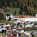 Blick auf Disentis zurück auf einem anderen Weg. Unten rechts der Bahnhof.