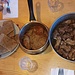 da sinistra: fette di cropa al forno - polenta con sugo - costine