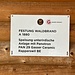 hing dort an einer Blockhütte