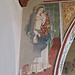 Sulla sinistra dell'arco centrale si trova una Madonna del latte databile alla seconda metà del '400.