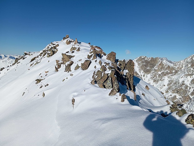 Am Westgipfel des Piz Glüna