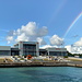 Blowing Point - Von hier geht's per Fähre gleich zurück nach Marigot (Saint-Martin). Zum Abschied aus Anguilla, aka Rainbow City, gibt's noch einen Regenbogen. Mit Fantasie erkennt man sogar einen zweiten.