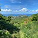 Im Abstieg nach Colombier - Blick über Rambaud auf das Meer. Hinten ist die Nachbarinsel Anguilla zu sehen.