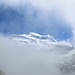 Während des Abstiegs vom Grand Tavé bessert sich das Wetter langsam und urplötzlich taucht aus den Wolken der Grand Combin auf!