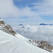 Monte Pelmo und Monte Civetta spitzen aus der Wolkendecke hervor