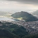 Vista su Lecco e sui laghi briantei sullo sfondo; in centro il Monte Barro.