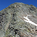 Rückblick zum Pizzo Croslina. Wir haben von der Felsrippe in der Bildmitte zum Schneefeld abgeseilt. Der offizielle Abstieg verläuft über die Flanke in der rechten Bildseite.