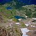 Affacciandosi alla cresta NW della spalla del Torena, compare la conca dei Laghi omonimi