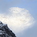 Un flebile sole allontana le nuvole risaltando la cima di Punta Gniffetti con la capanna Regina Margherita