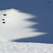 Felsnadeln im Schnee: Abbild des Falknisgrats in der Mazoraebene